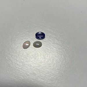 3 opals and one tanzanite oval gems